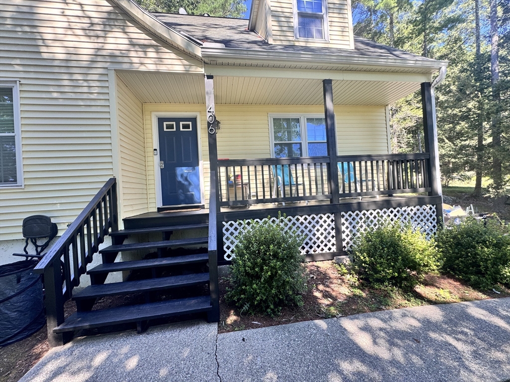 406 Lebanon Hill Road Southbridge, MA 01550 - Photo 28 of 36 a front view of a house with a garden