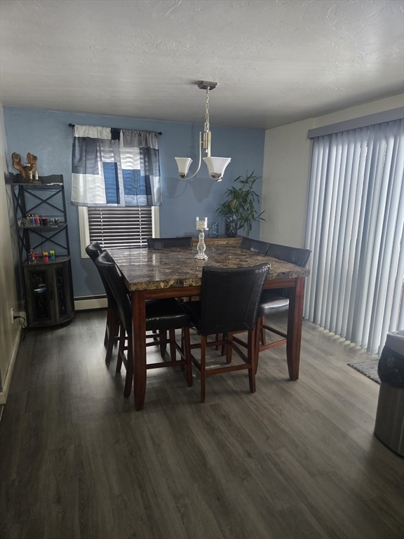 406 Lebanon Hill Road Southbridge, MA 01550 - Photo 10 of 36 a view of a dining room with furniture window and wooden floor