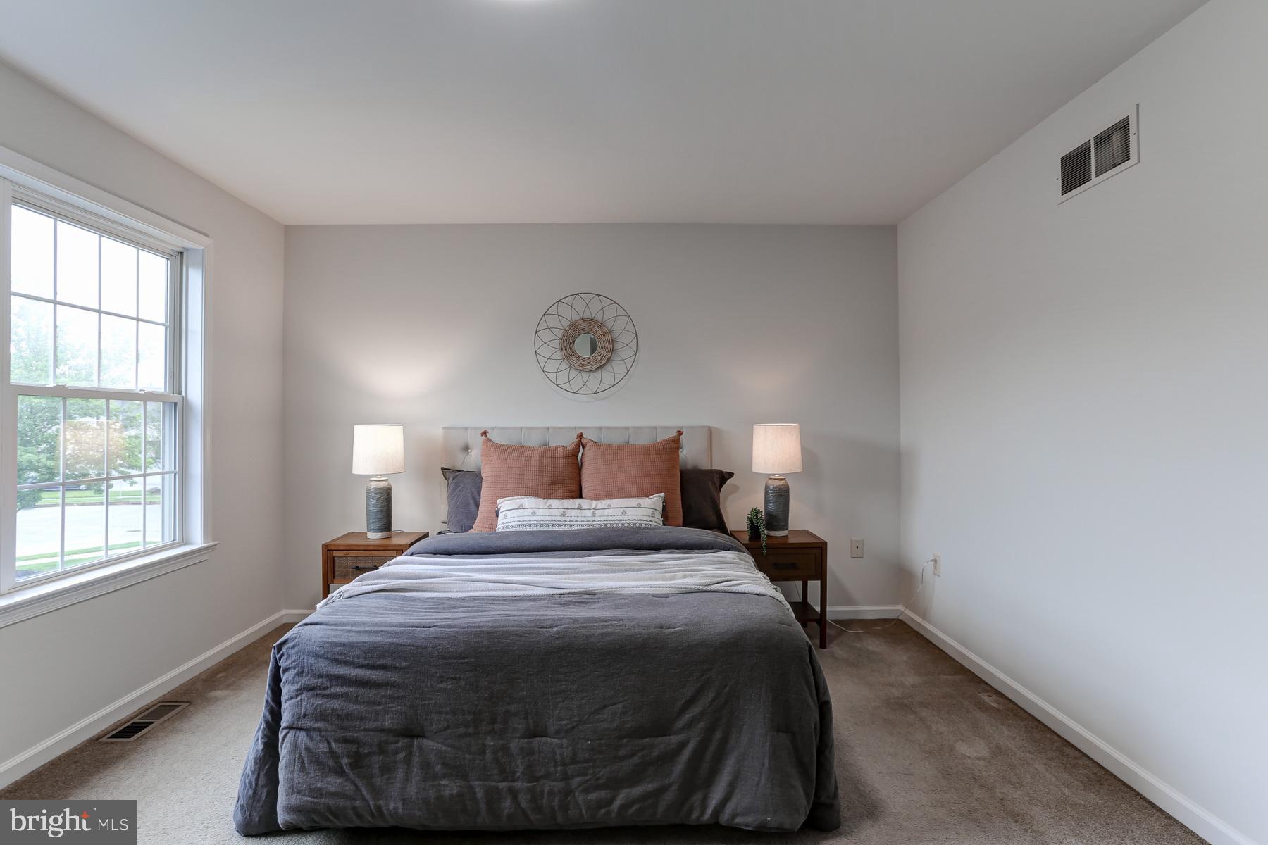 352 Deerfield Drive Mount Joy, PA 17552 - Photo 14 of 21 a bedroom with a bed and window