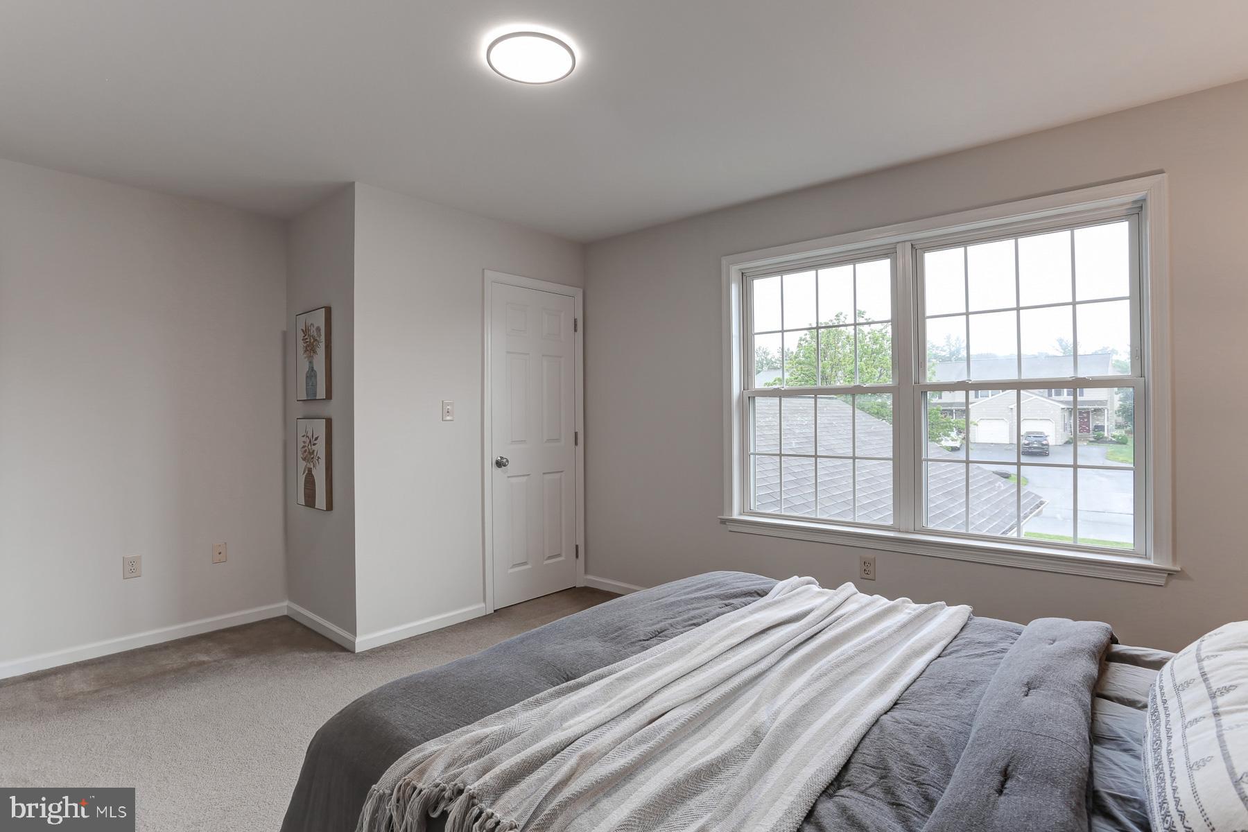 352 Deerfield Drive Mount Joy, PA 17552 - Photo 15 of 21 a bedroom with a bed and a window