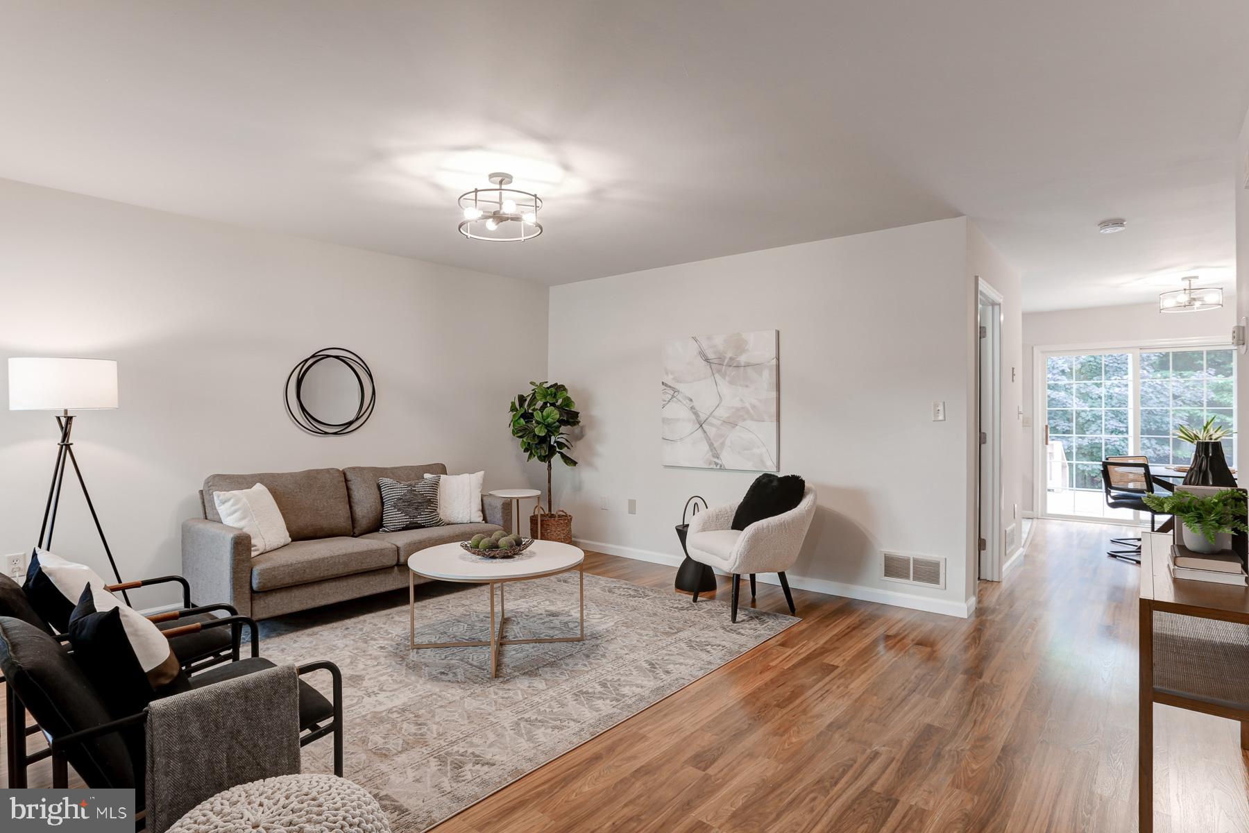352 Deerfield Drive Mount Joy, PA 17552 - Photo 4 of 21 a living room with furniture and wooden floor