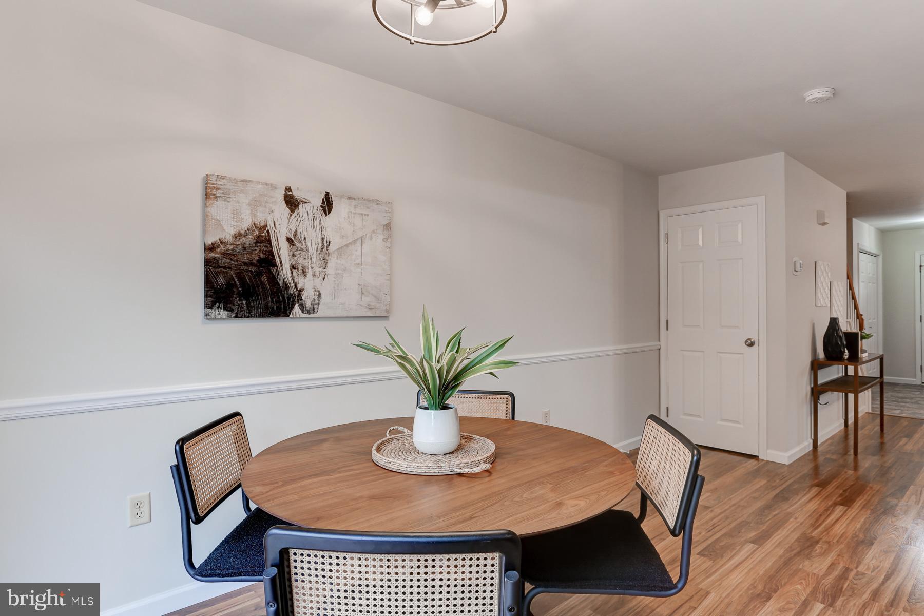 352 Deerfield Drive Mount Joy, PA 17552 - Photo 8 of 21 a view of a dining room with furniture and wooden floor