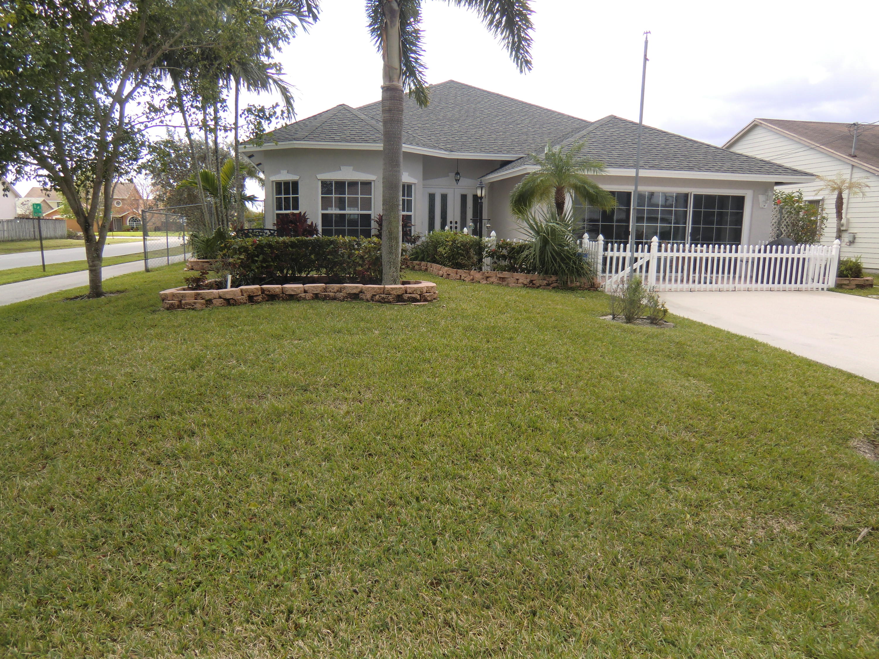 6354 Barbara Street Jupiter, FL 33458 - Photo 1 of 39 Front