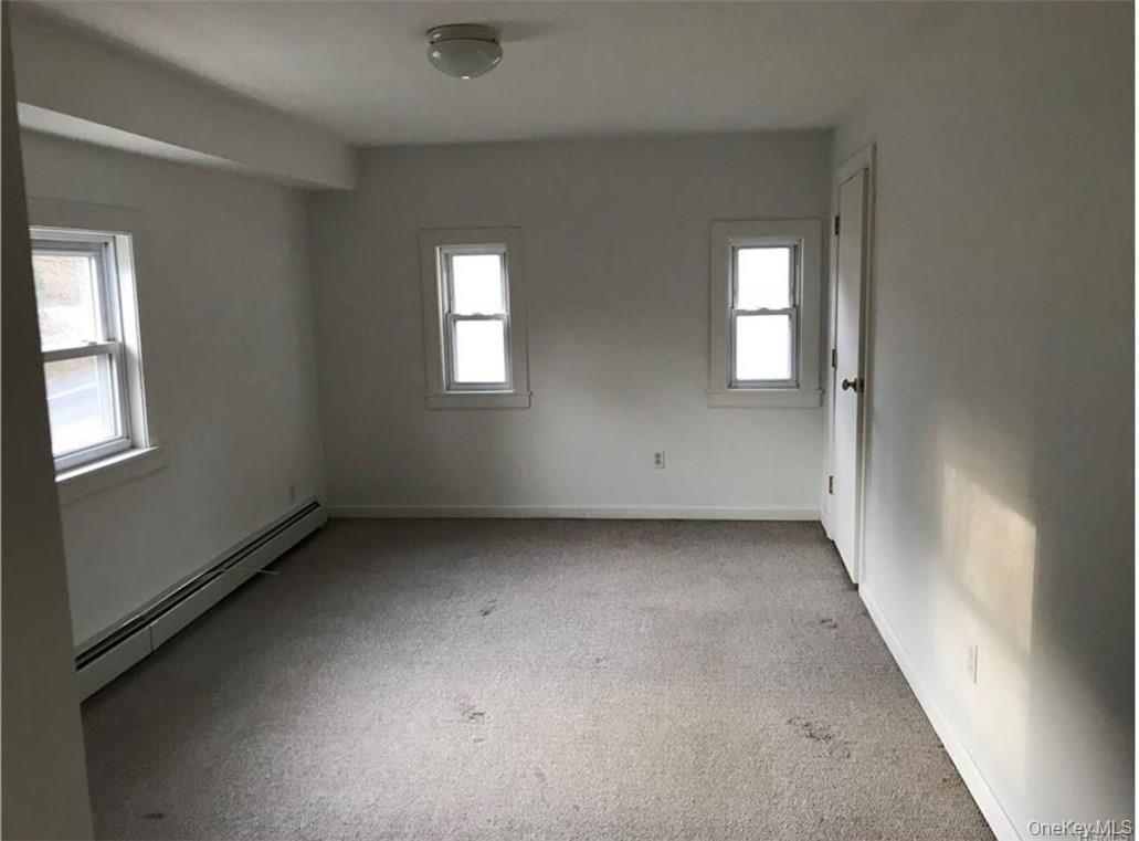 172 County Rte 105 Highland Mills, NY 10930 - Photo 4 of 5 an empty room with windows