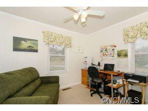 178 Brookshire Road Leicester, NC 28748 - Photo 14 of 16 a living room with furniture and a window