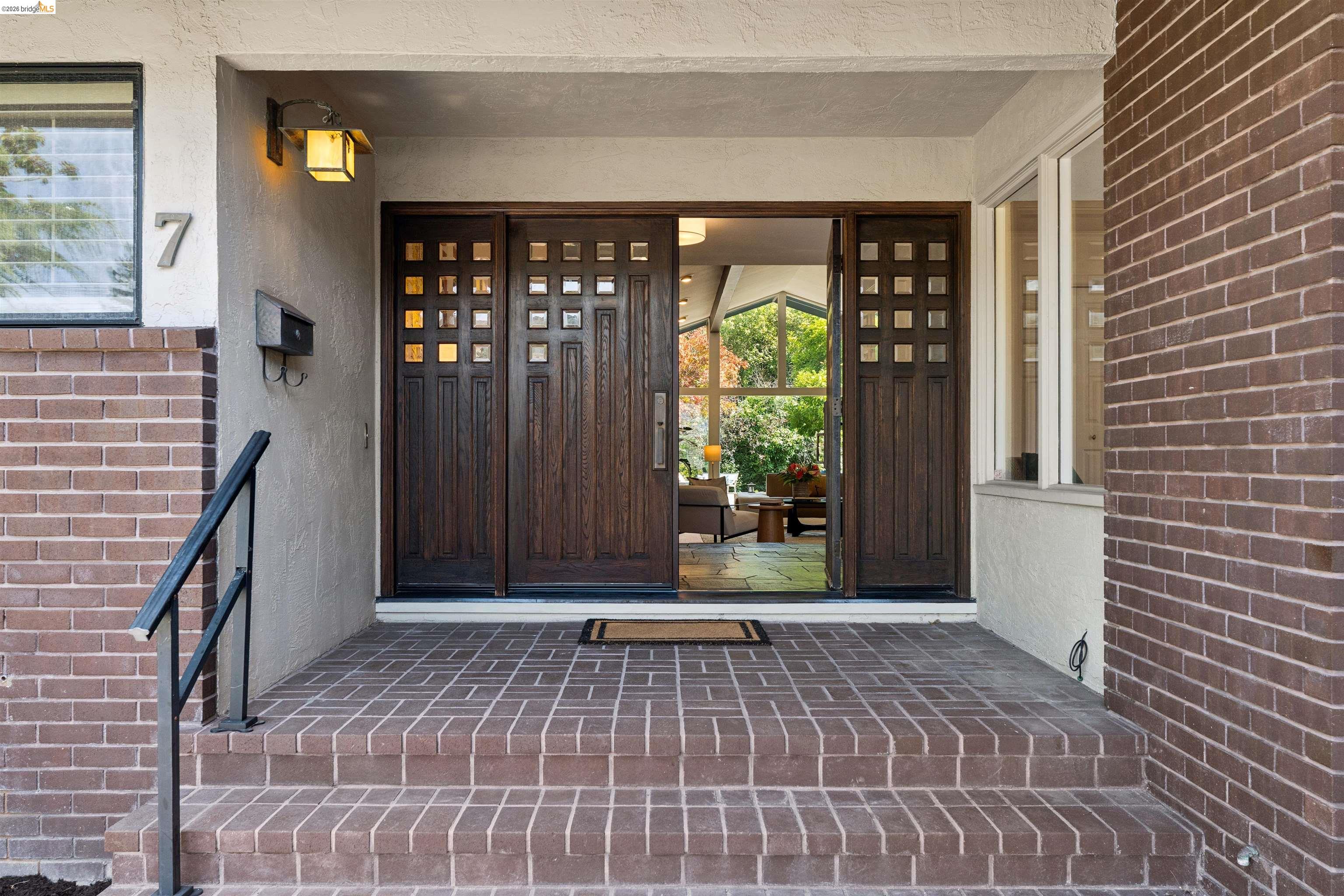 7 Jo Lin Court El Sobrante, CA 94803 - Photo 21 of 99 Entryway with a brick facade and steps leading to a recessed porch