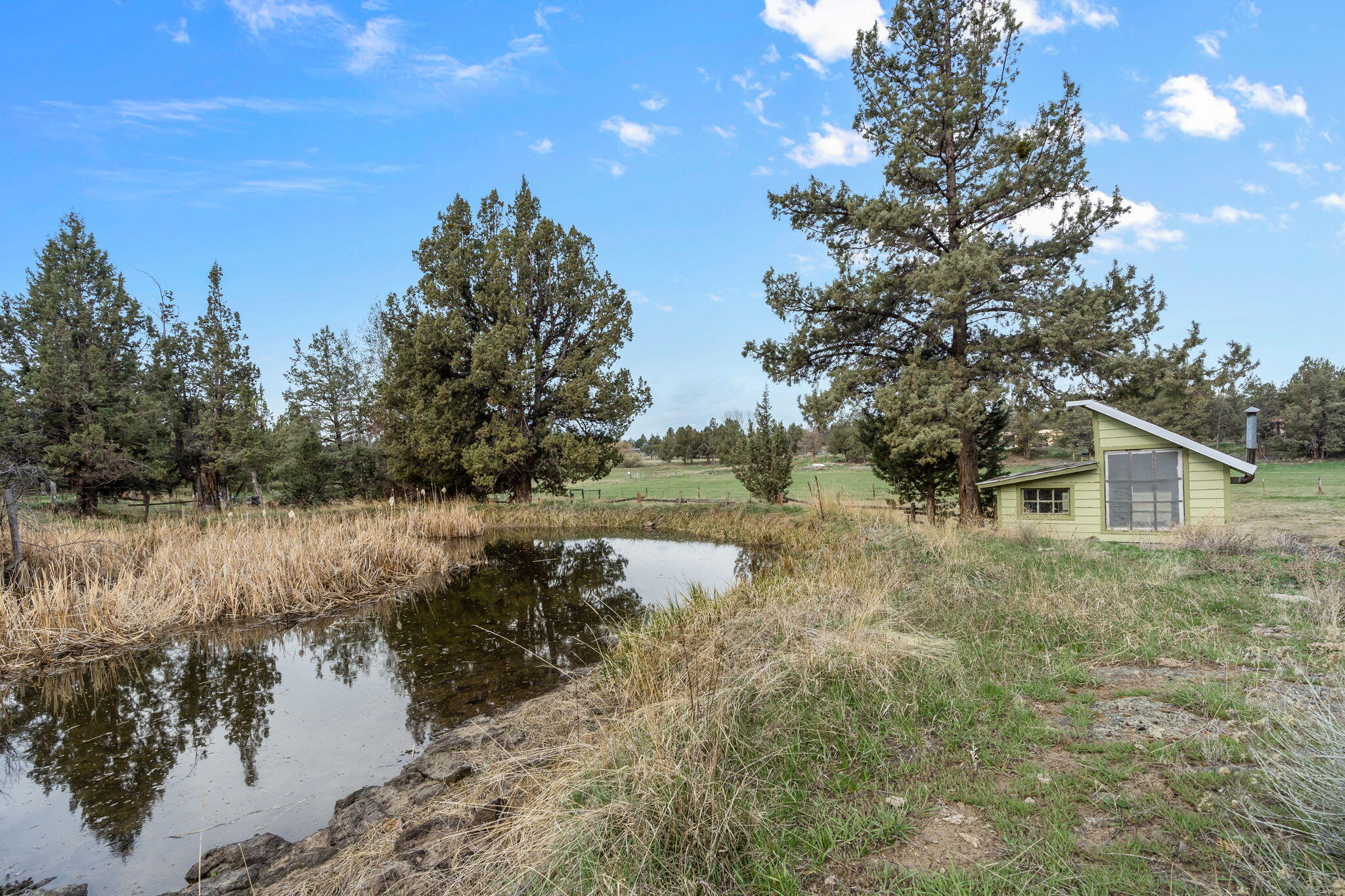 22655 Alfalfa Market Road Bend, OR 97701 - Photo 51 of 58 Irrigation pond. Flood irrigation system in place