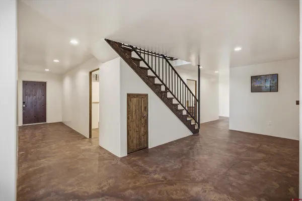 a view of an entryway with staircase