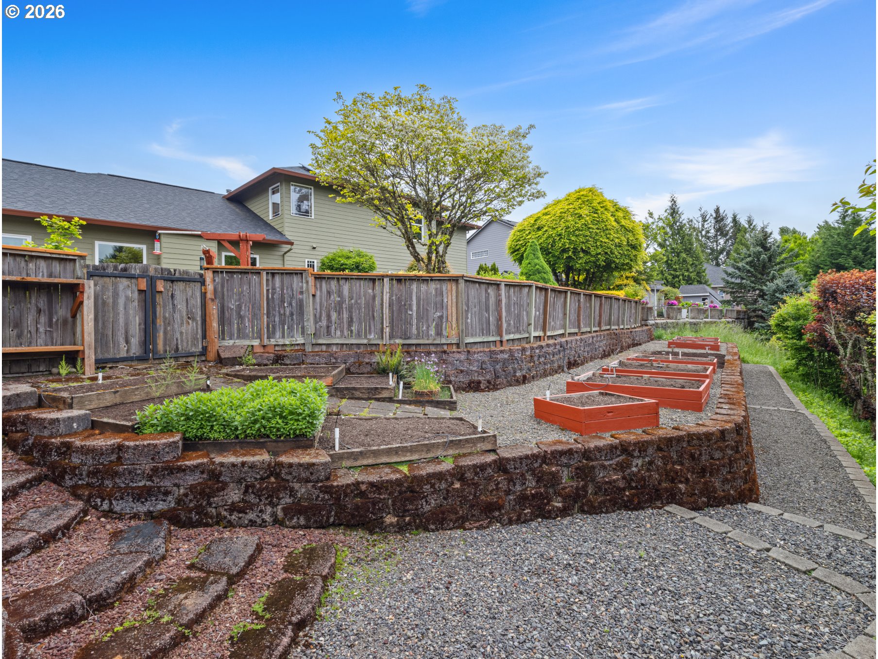 366 Southwest 37th Circle Gresham, OR 97080 - Photo 44 of 47 a view of a backyard with plants and outdoor seating