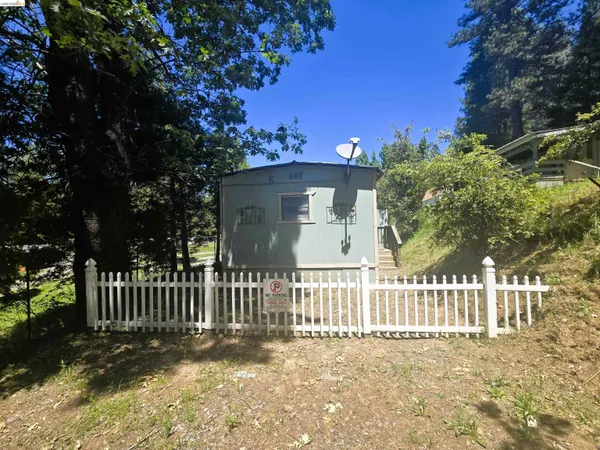 a view of a wooden fence
