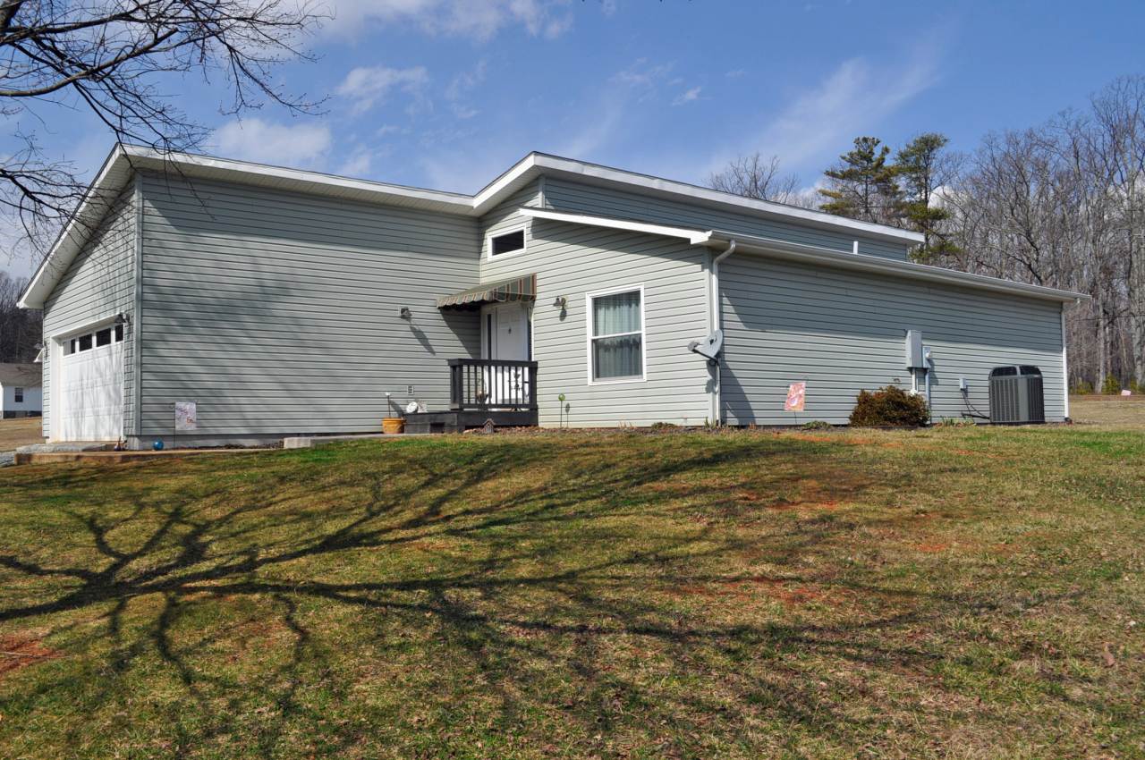 110 Mallard Point Road Wirtz, VA 24184 - Photo 1 of 34 a front view of a house with a yard