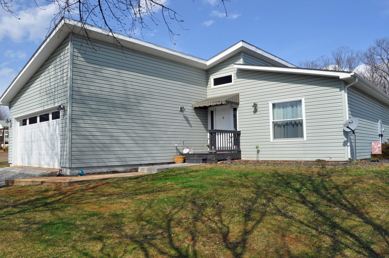 110 Mallard Point Road Wirtz, VA 24184 - Photo 2 of 34 a front view of a house with a yard