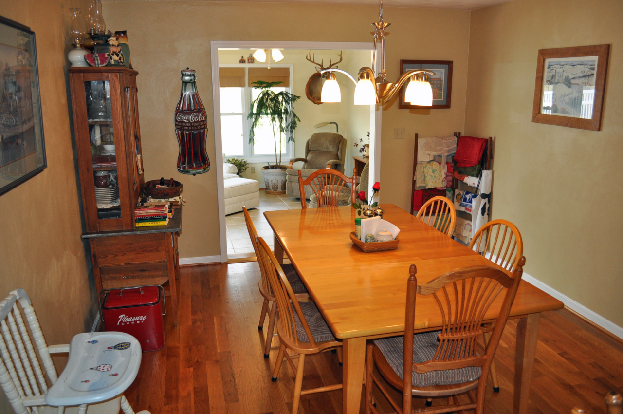 110 Mallard Point Road Wirtz, VA 24184 - Photo 14 of 34 a view of a dining room with furniture and wooden floor