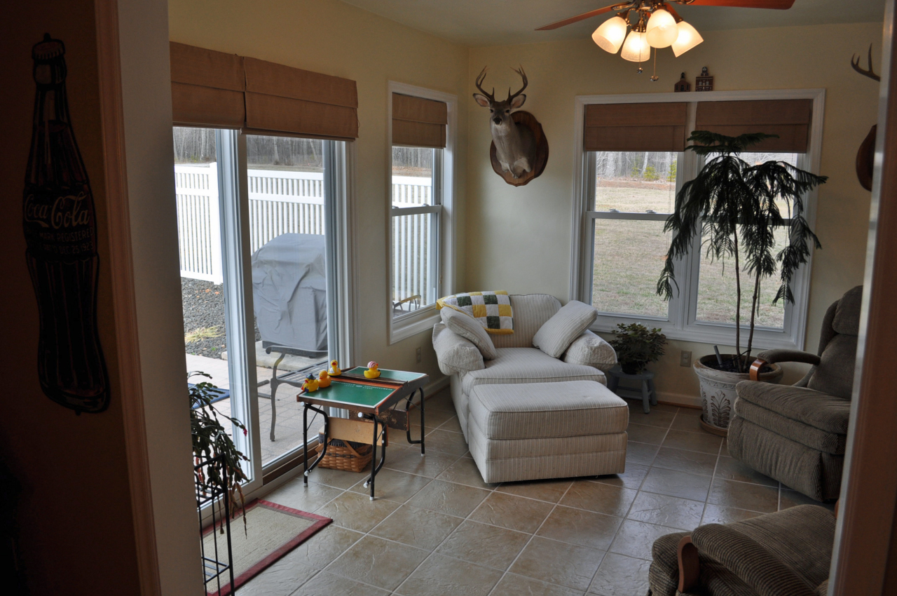 110 Mallard Point Road Wirtz, VA 24184 - Photo 16 of 34 a living room with furniture and a large window