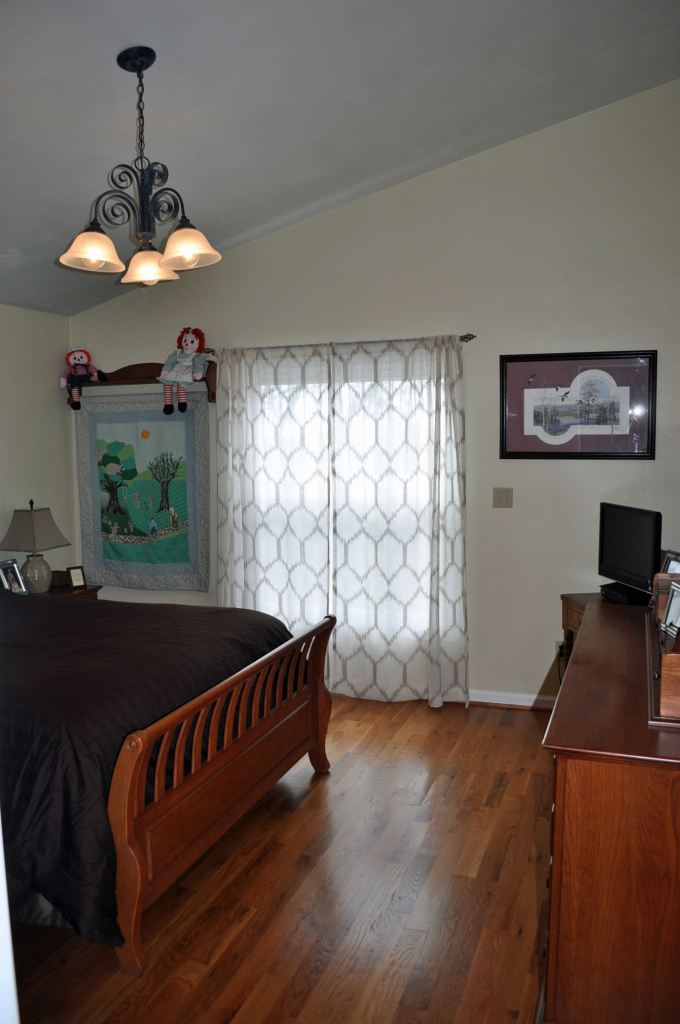110 Mallard Point Road Wirtz, VA 24184 - Photo 18 of 34 a living room with furniture and a flat screen tv