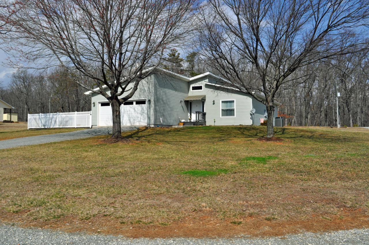110 Mallard Point Road Wirtz, VA 24184 - Photo 3 of 34 a view of a house with a yard