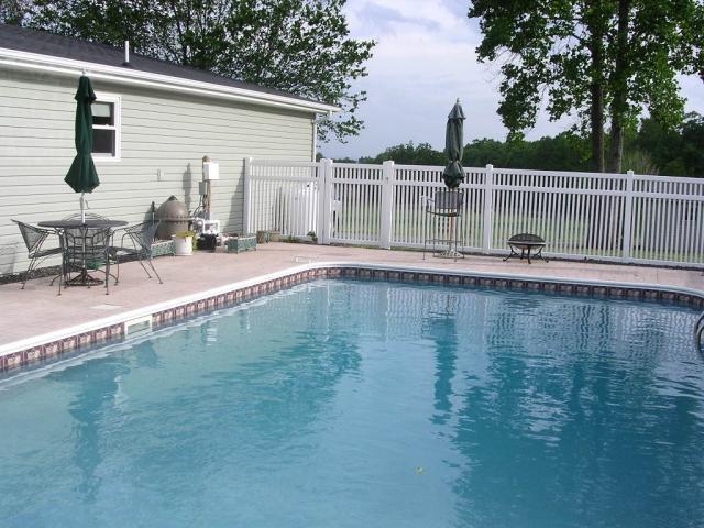 110 Mallard Point Road Wirtz, VA 24184 - Photo 32 of 34 a backyard of a house with table and chairs