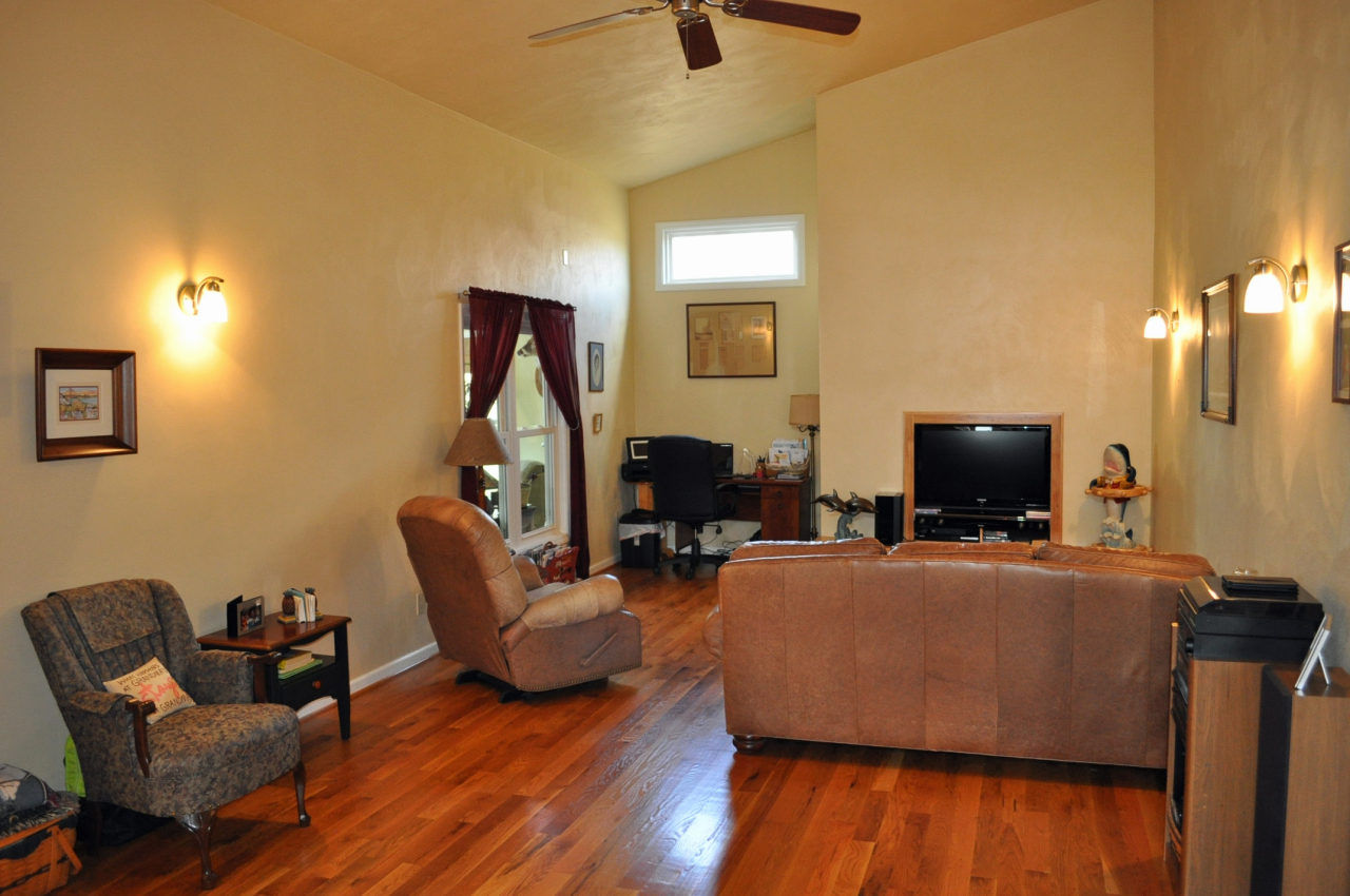 110 Mallard Point Road Wirtz, VA 24184 - Photo 5 of 34 a living room with furniture and a flat screen tv