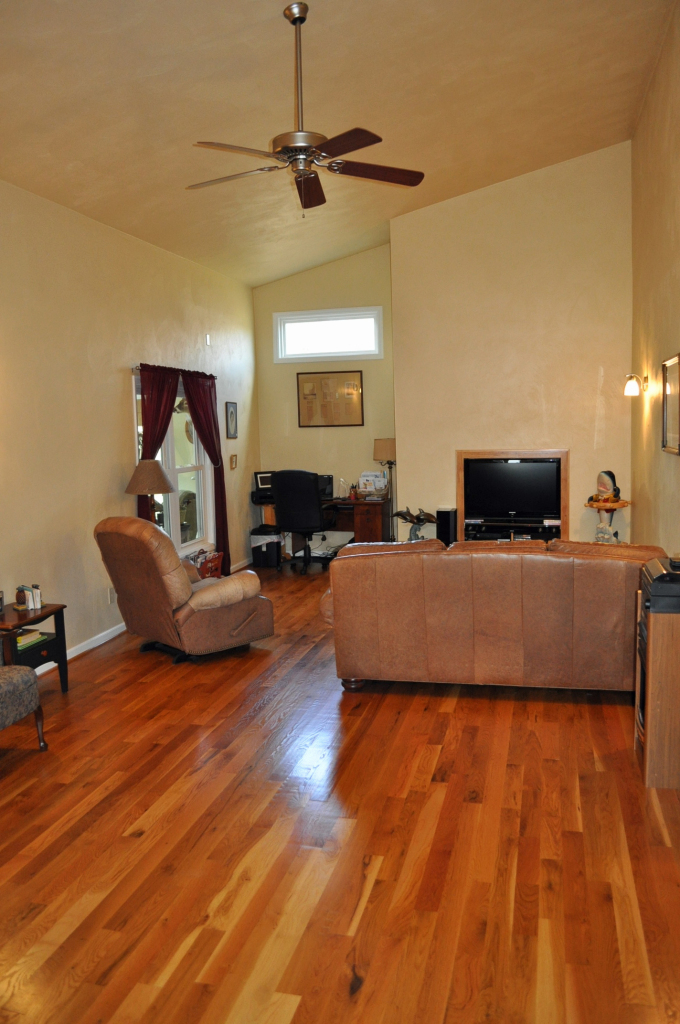 110 Mallard Point Road Wirtz, VA 24184 - Photo 6 of 34 a living room with furniture and a wooden floor