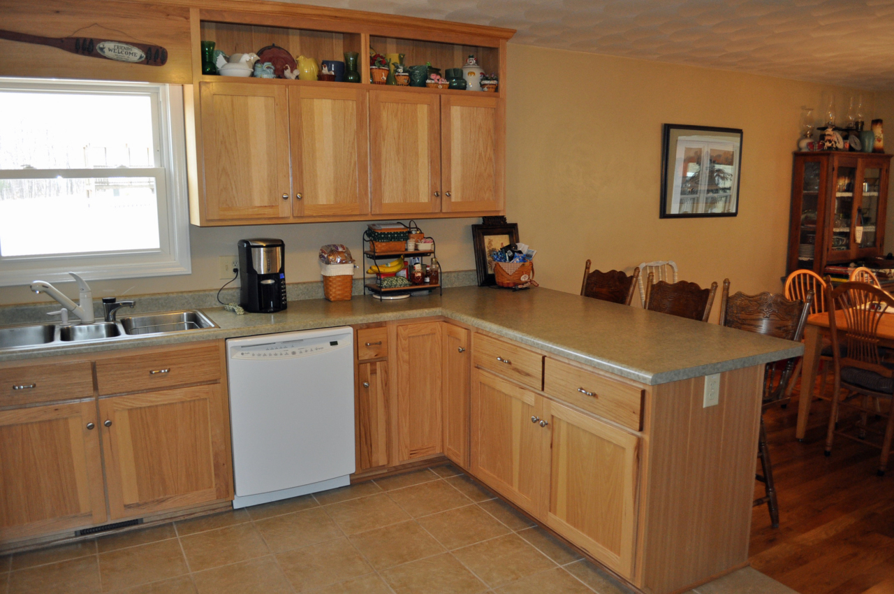 110 Mallard Point Road Wirtz, VA 24184 - Photo 10 of 34 a kitchen with a sink cabinets and window
