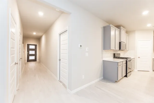 a view of a kitchen with a sink