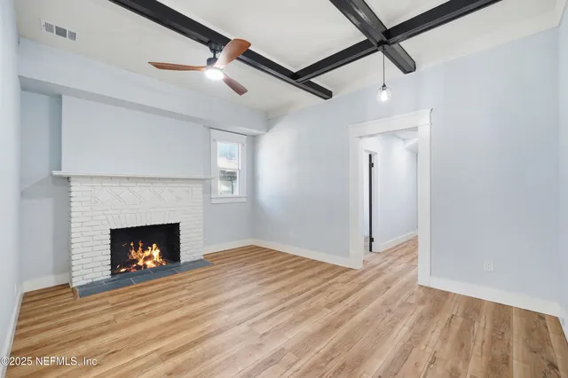 a white building with a fireplace