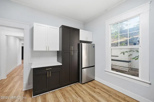 a view of entryway with wooden floor