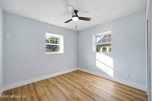 a bathroom with a bathtub and a sink