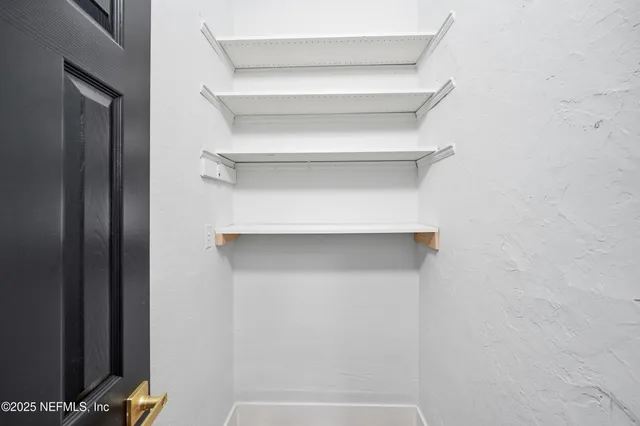 a view of storage and utility room