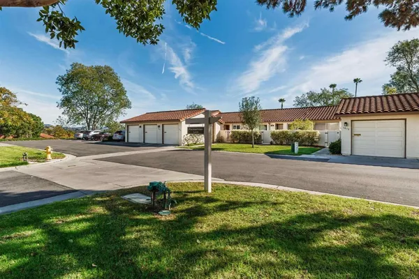 a house view with a garden space