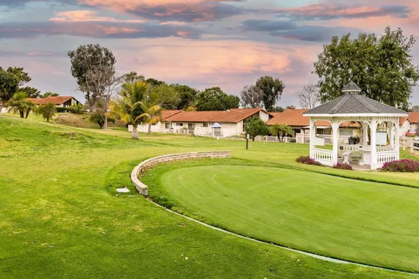 a view of a swimming pool with a lake view