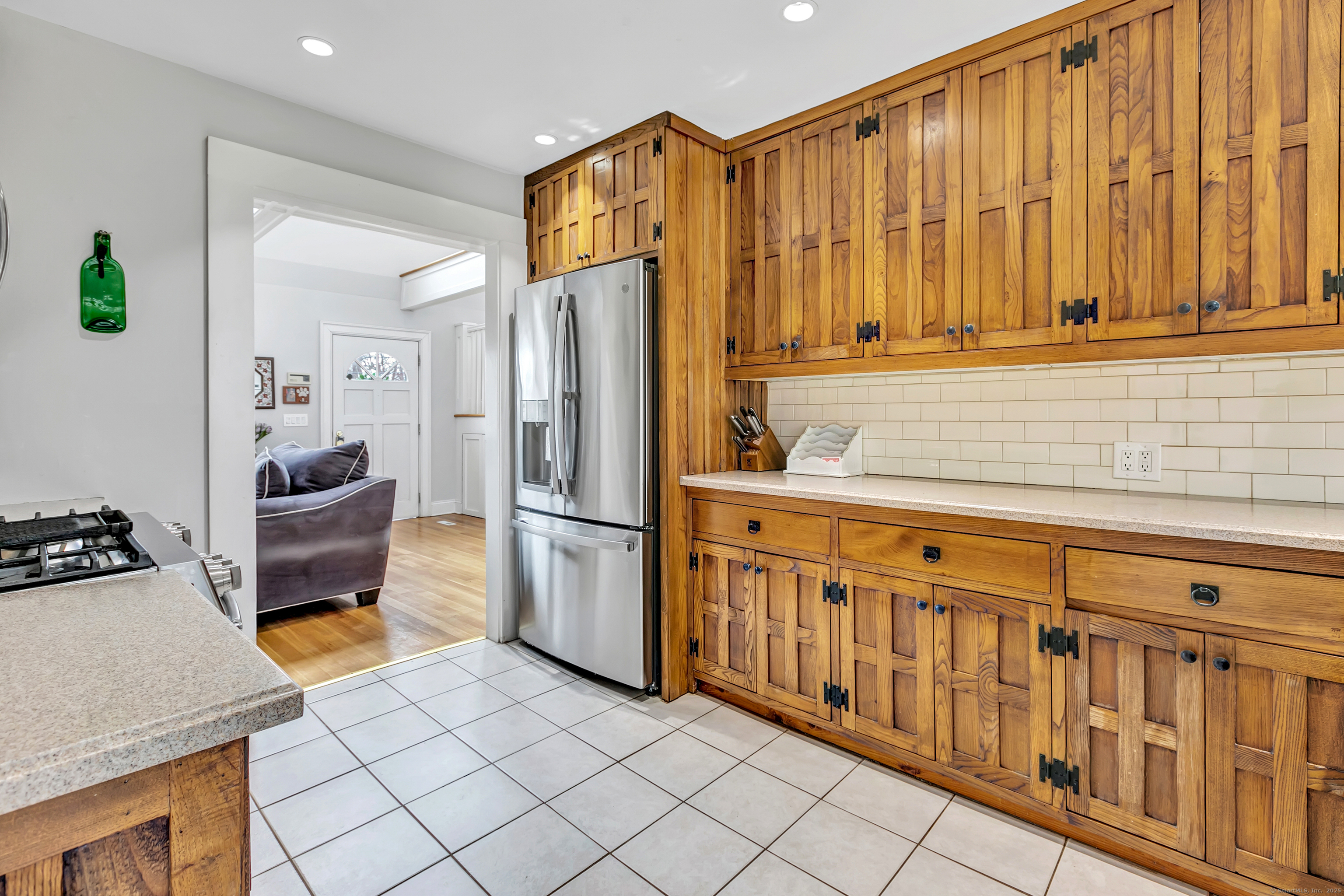 41 Mohawk Drive Norwalk, CT 06851 - Photo 12 of 31 a kitchen with stainless steel appliances a refrigerator and a stove