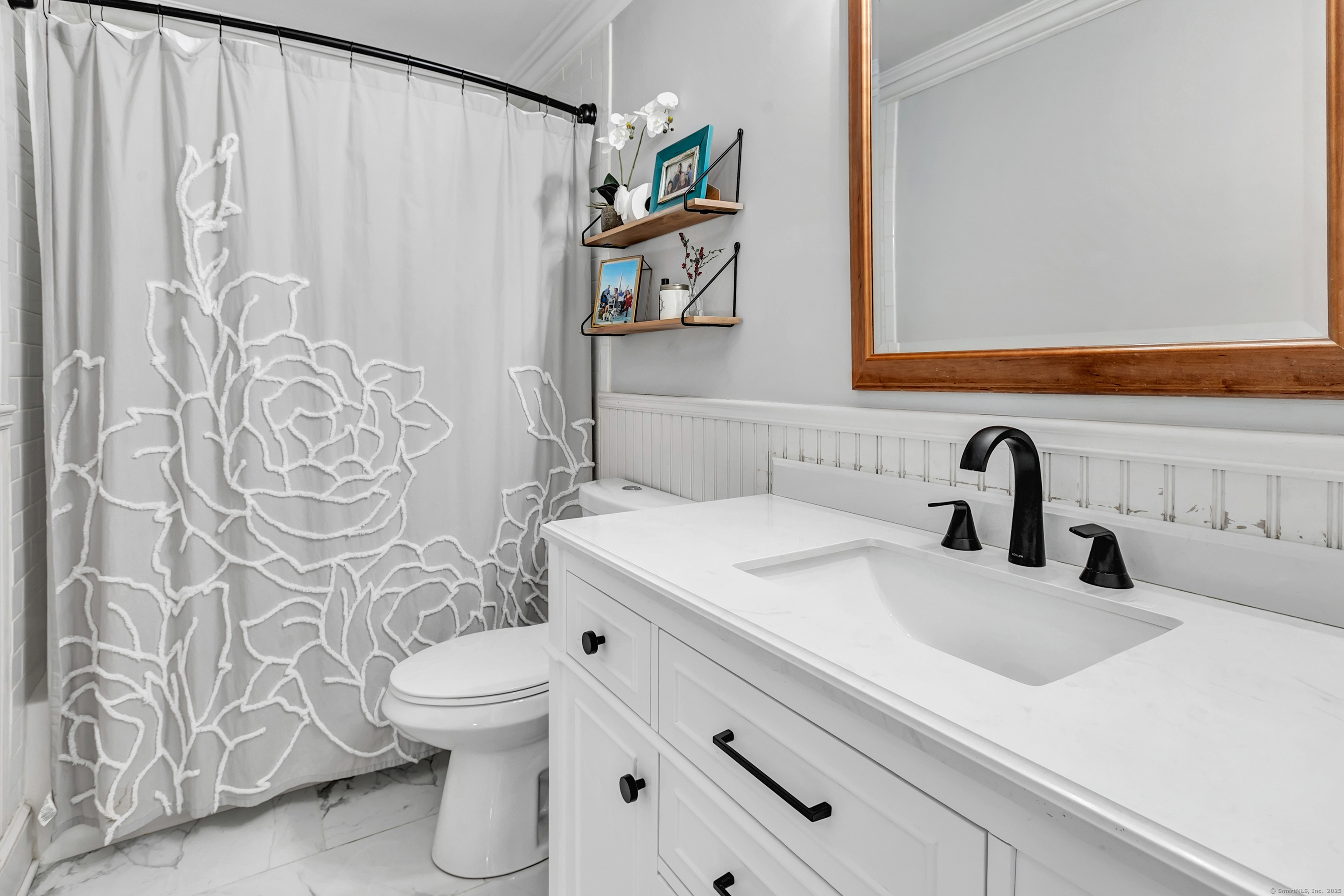 41 Mohawk Drive Norwalk, CT 06851 - Photo 17 of 31 a bathroom with a sink and a toilet