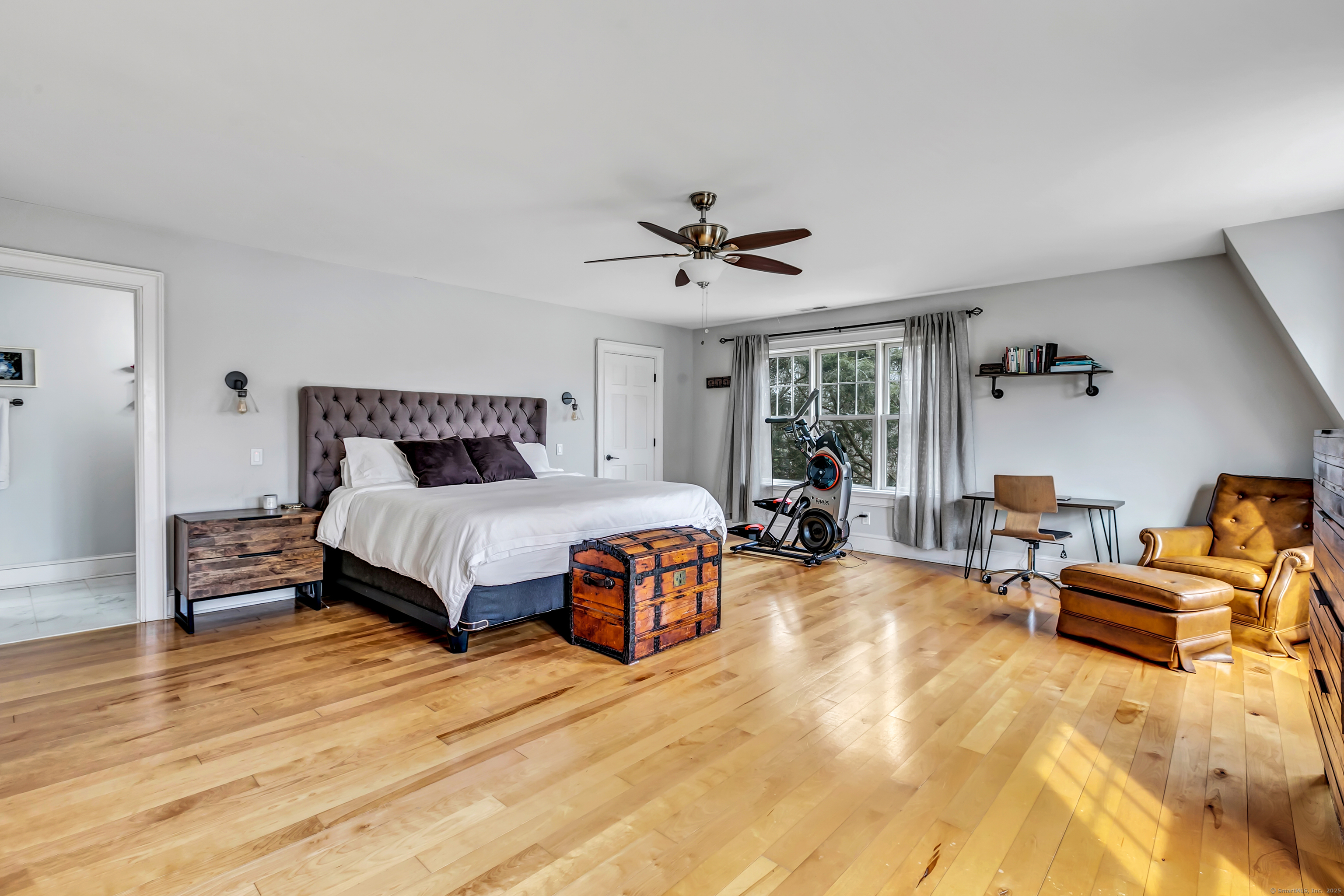 41 Mohawk Drive Norwalk, CT 06851 - Photo 20 of 31 a bedroom with a bed and ceiling fan