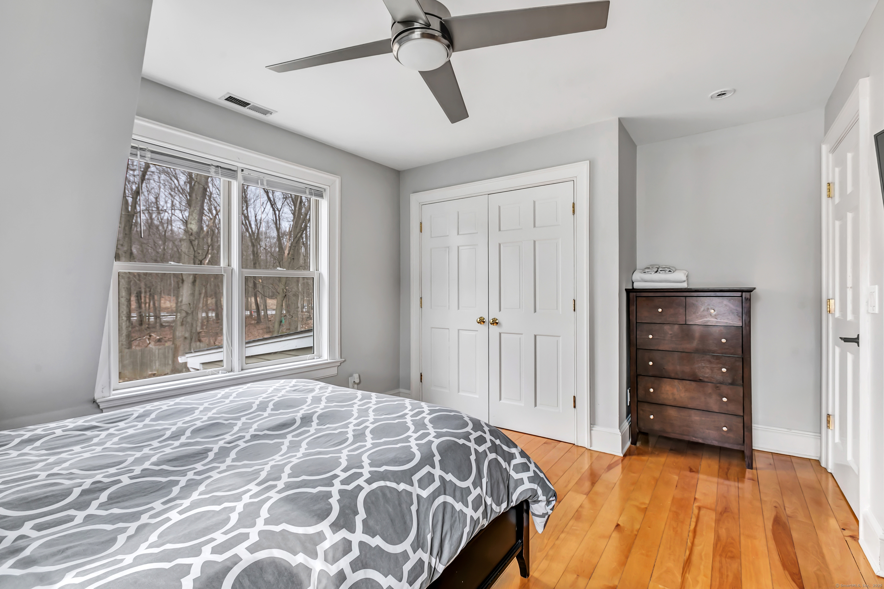 41 Mohawk Drive Norwalk, CT 06851 - Photo 24 of 31 a bedroom with a bed and a window
