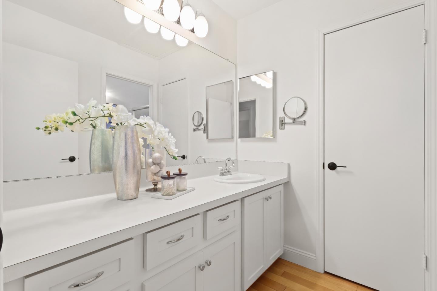 28 Farm Road Los Altos, CA 94024 - Photo 12 of 28 a bathroom with a sink a vanity and a mirror