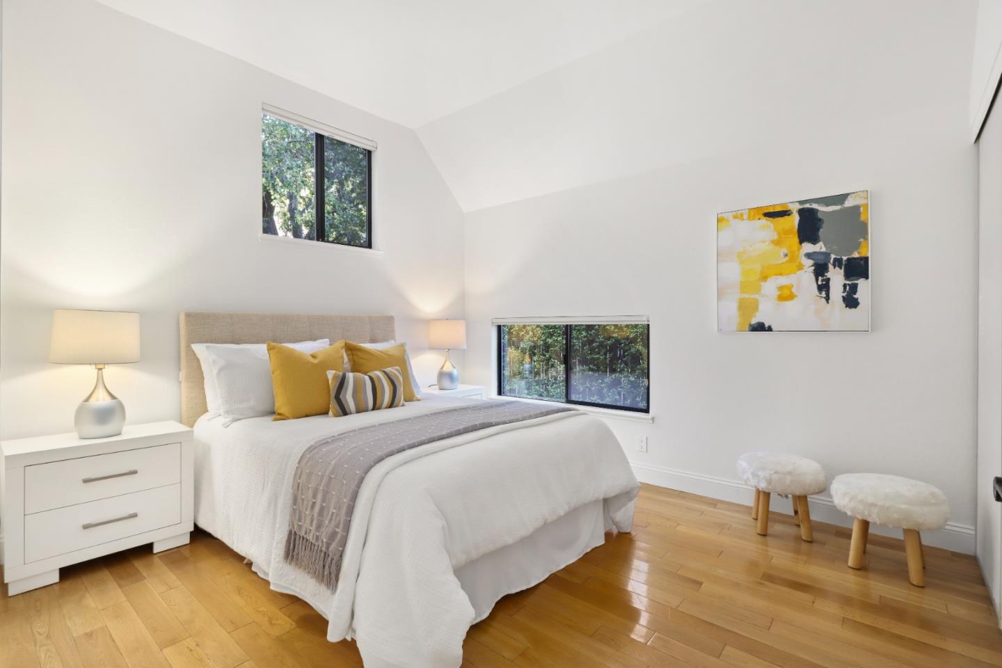 28 Farm Road Los Altos, CA 94024 - Photo 14 of 28 a bedroom with a bed and painting on the wall