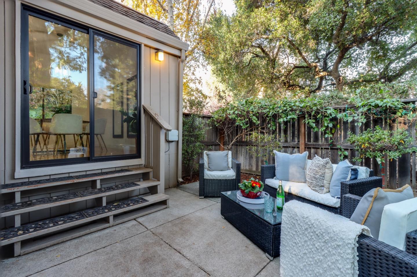 28 Farm Road Los Altos, CA 94024 - Photo 20 of 28 a backyard of a house with barbeque oven and furniture