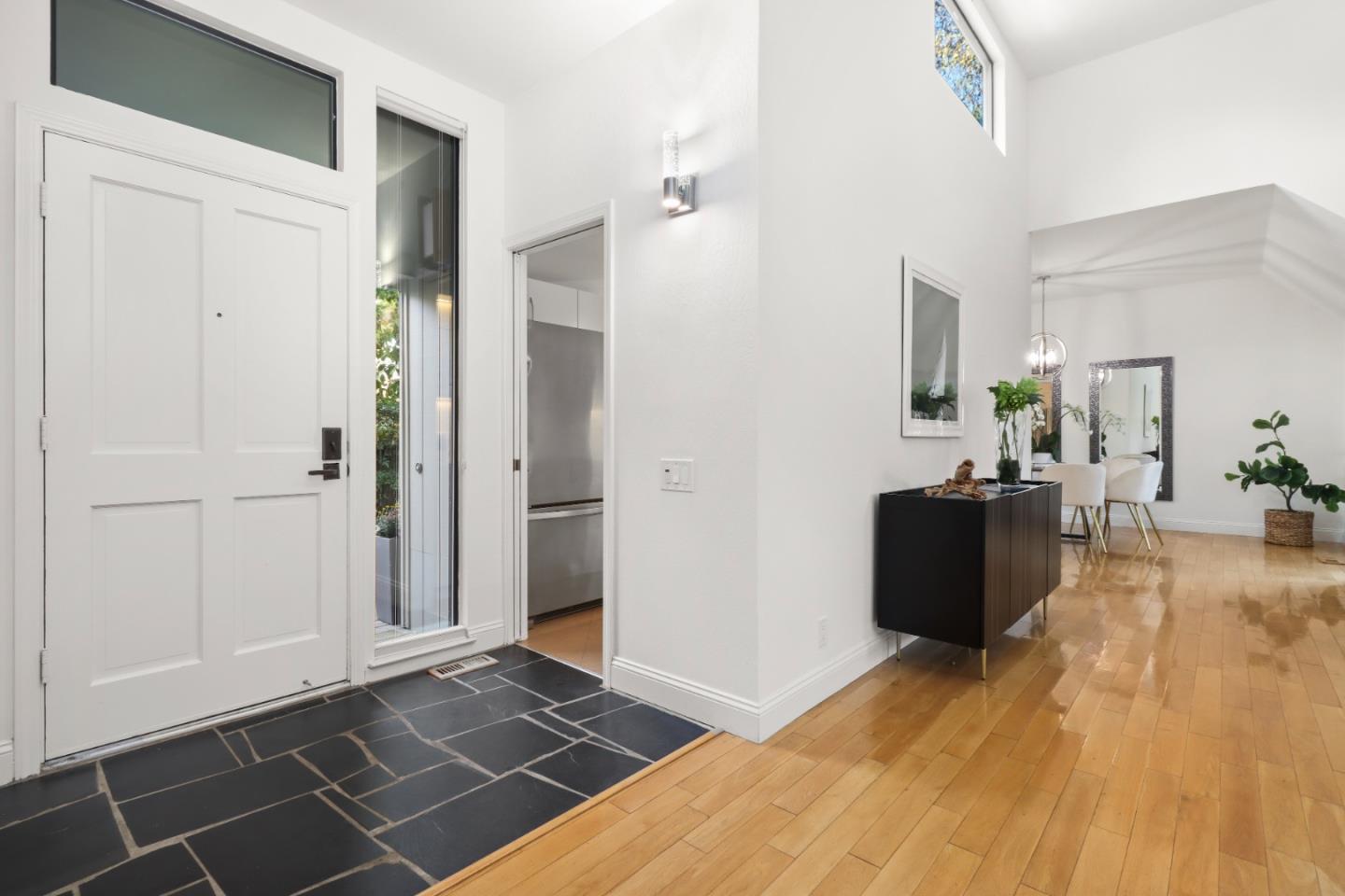 28 Farm Road Los Altos, CA 94024 - Photo 3 of 28 a living room with a couch and a view of kitchen