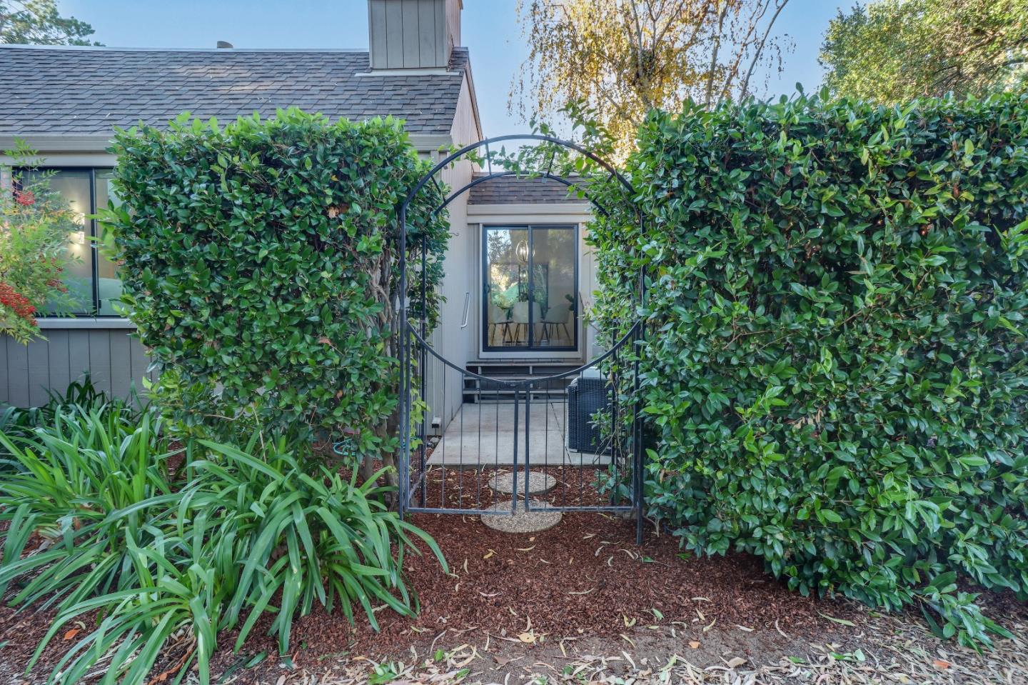 28 Farm Road Los Altos, CA 94024 - Photo 22 of 28 a front view of a house with garden