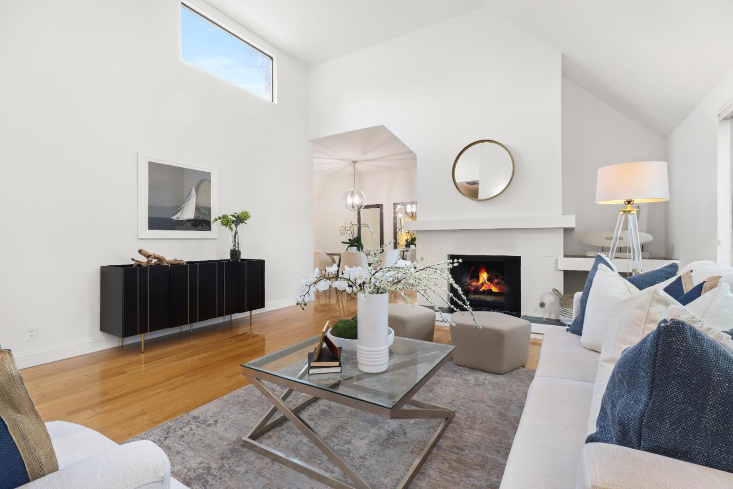 28 Farm Road Los Altos, CA 94024 - Photo 4 of 28 a living room with furniture a fireplace and a potted plant