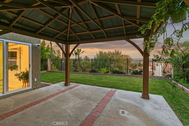 a view of a porch with a big yard