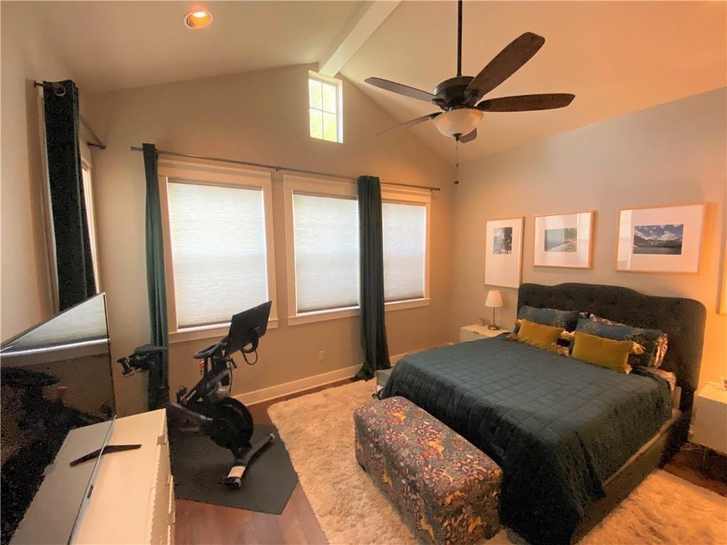 926 East 54th Street, Unit A Austin, TX 78751 - Photo 5 of 8 a bedroom with a bed and a large window