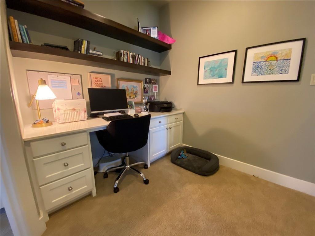 926 East 54th Street, Unit A Austin, TX 78751 - Photo 7 of 8 a view of a workspace with furniture