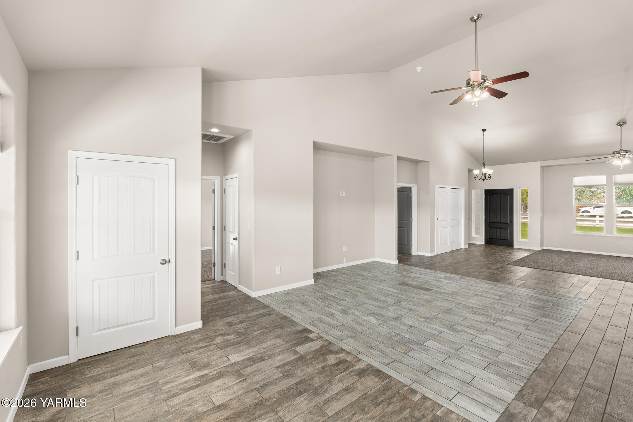 11625 Missimer Road Prosser, WA 99350 - Photo 14 of 40 a view of a kitchen with a sink and a chandelier fan