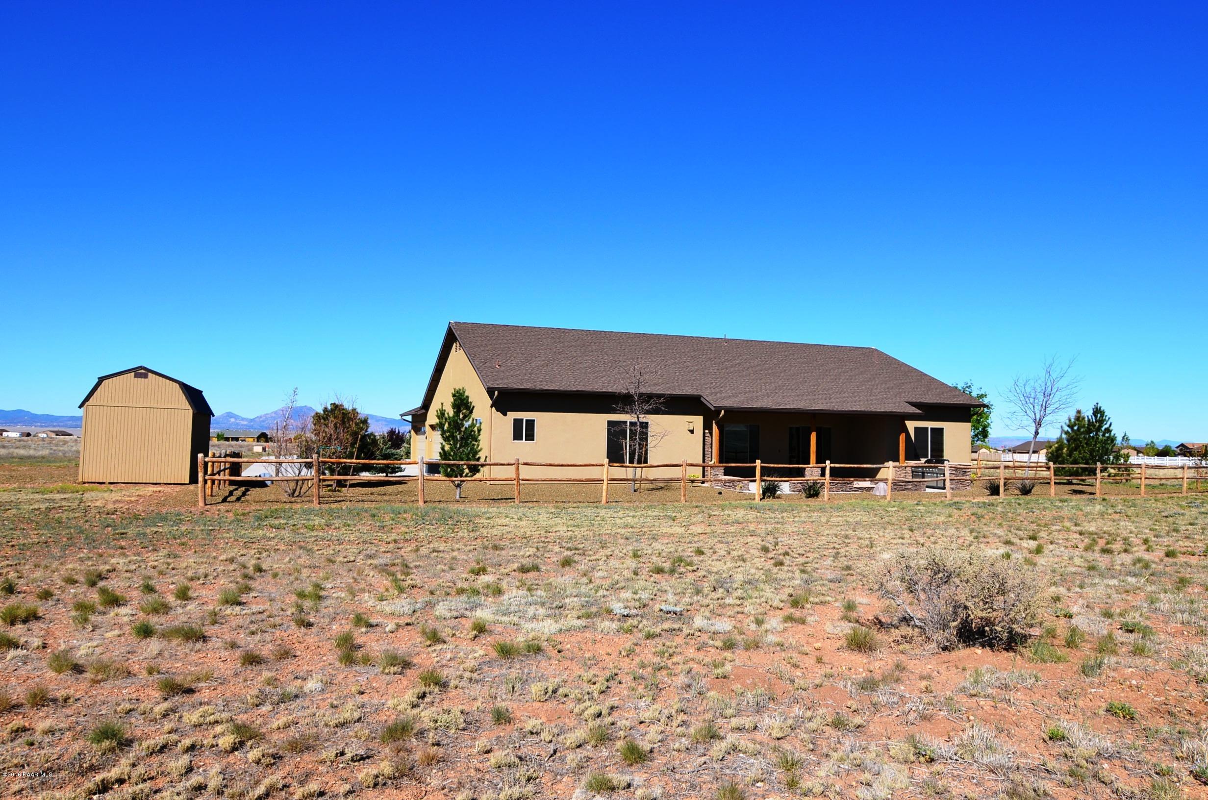9474 Dows Ranch Road Prescott Valley, AZ 86315 - Photo 24 of 55 a house with a outdoor space