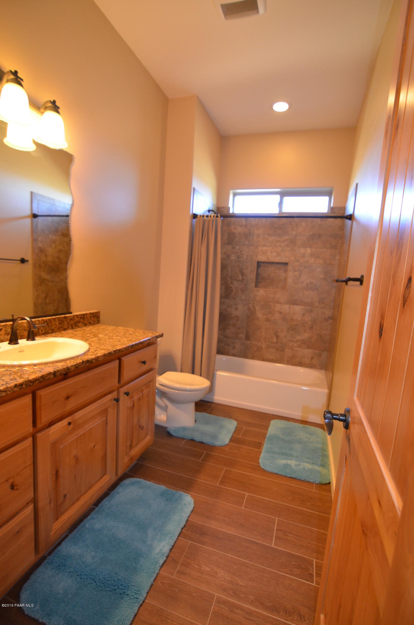 9474 Dows Ranch Road Prescott Valley, AZ 86315 - Photo 33 of 55 a bathroom with a sink and a mirror