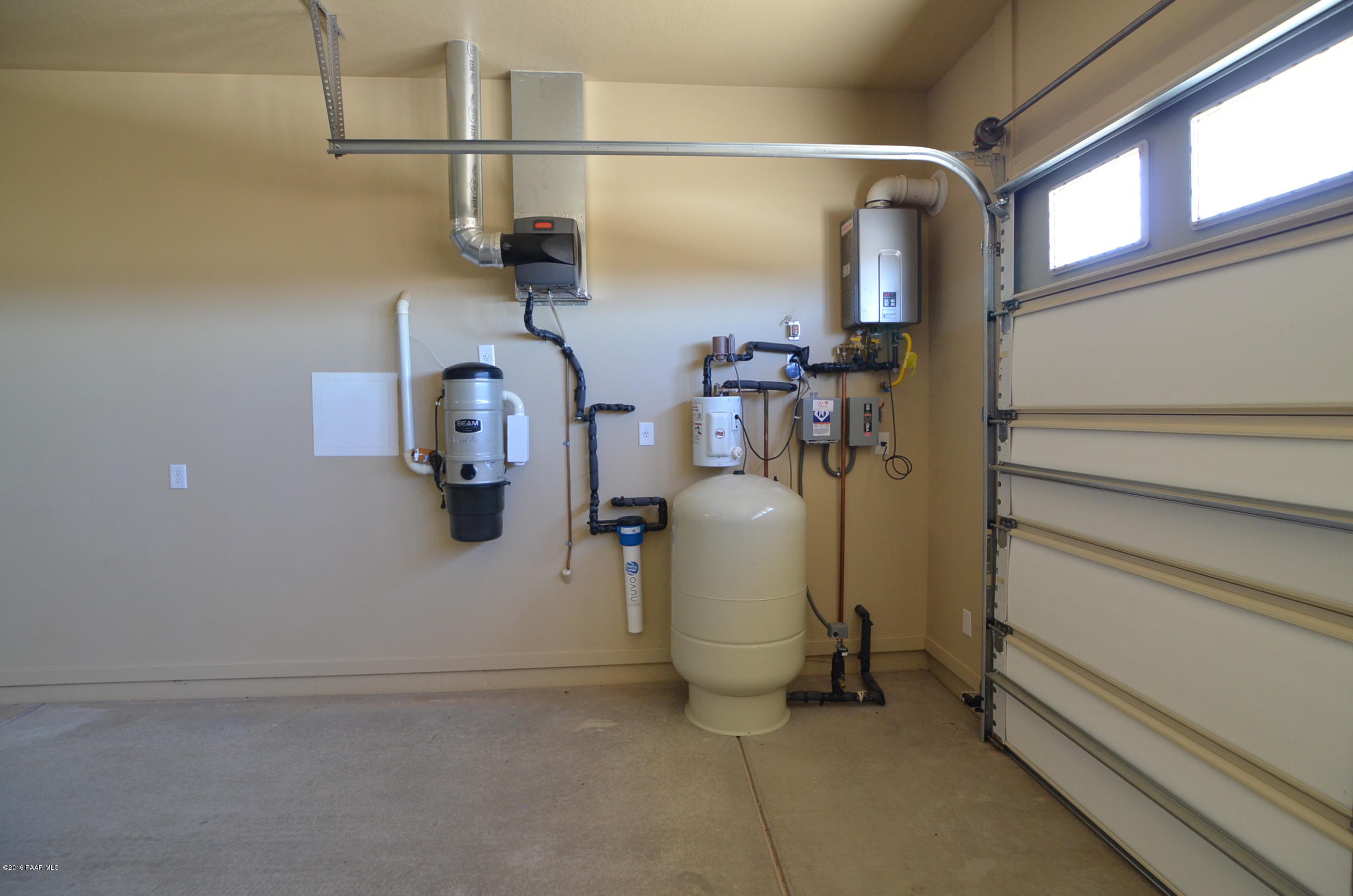9474 Dows Ranch Road Prescott Valley, AZ 86315 - Photo 41 of 55 a view of storage and utility room with racks on the wall