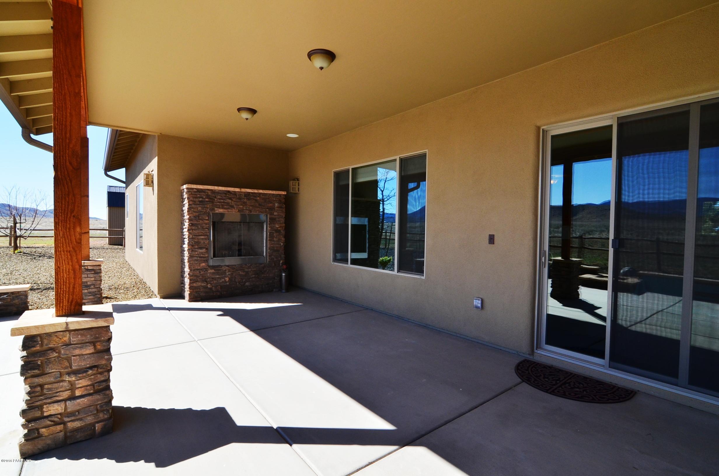 9474 Dows Ranch Road Prescott Valley, AZ 86315 - Photo 8 of 55 Back Patio with Fireplace1