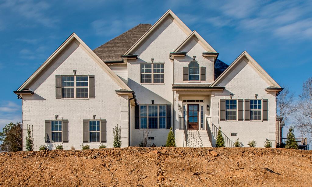 7314 Allans Ridge Lane Fairview, TN 37062 - Photo 1 of 30 a front view of a house with a yard